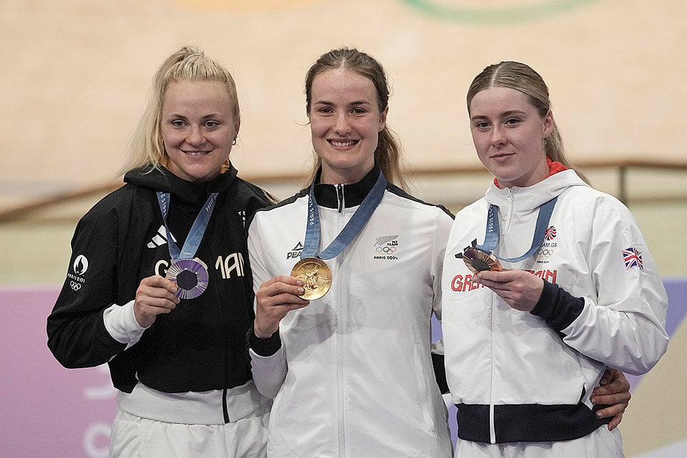 | Photo: AP/Thibault Camus : Paris Olympics Track Cycling women's sprint event: Lea Friedrich of Germany (Silver), Ellesse Andrews of New Zealand (Gold) and Emma Finucane of Britain (Bronze)